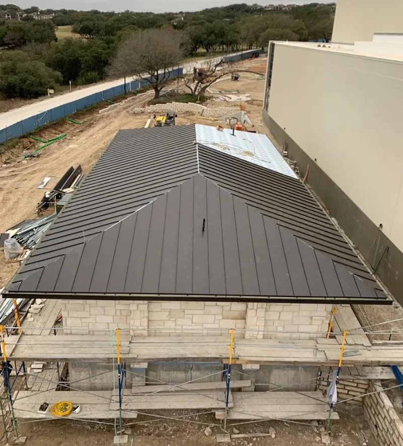 Metal roof new construction with scaffolding in Rutherford